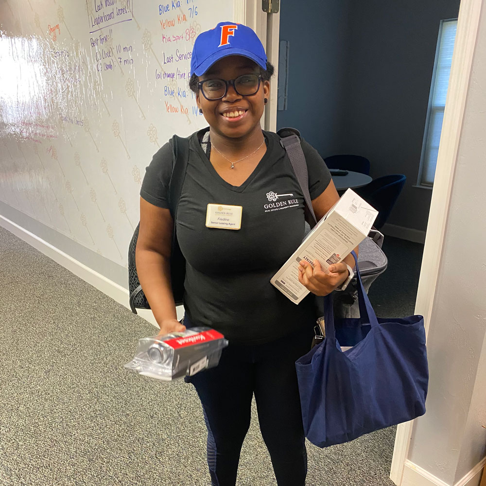 Golden Rule Real Estate Realtor getting ready to meet with a client